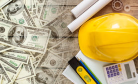 Construction hat and money
