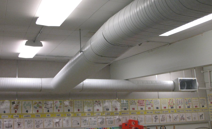 lined round ductwork in classroom